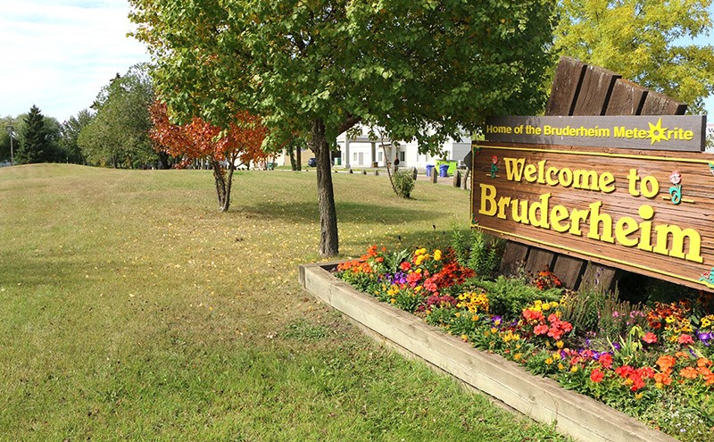 welcome sign surrounded by flowers
